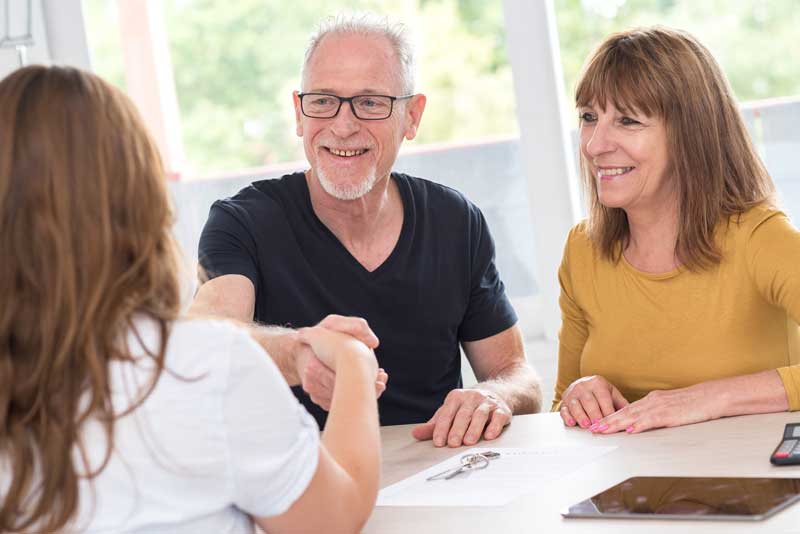 Customers chatting with conveyancer