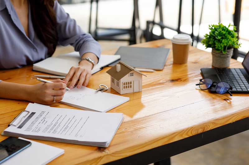 Conveyancing solicitor at desk